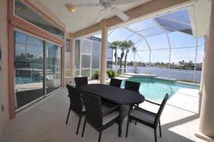 Sunset Bay Beautiful Pool Home - Bring Your Boat or Jet Ski - Canal with Dock- Sleeps 10 - 4 BD - image 2