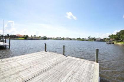 Sunset Bay Beautiful Pool Home - Bring Your Boat or Jet Ski - Canal with Dock- Sleeps 10 - 4 BD - image 3