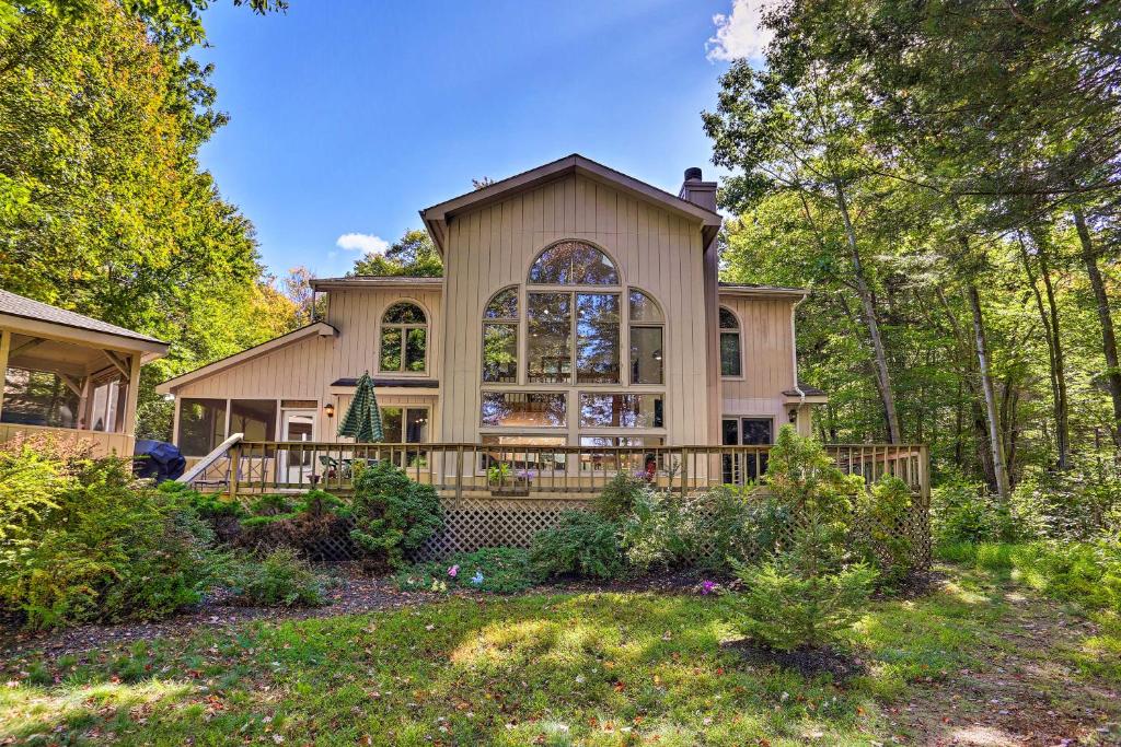 Superb Pocono Lake House with Private Beach and Dock! - main image