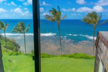 Sealodge C7-oceanfront views top floor privacy bright tropical interior - image 16