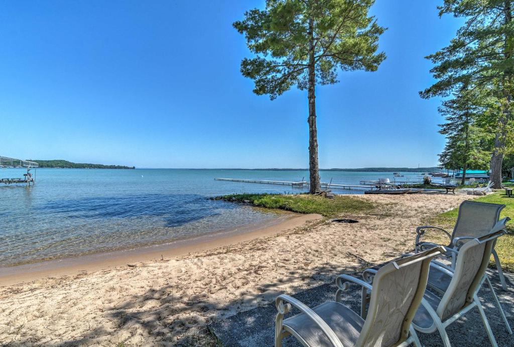 Modern Torch Lake Cottage with Dock and Fire Pit! - main image