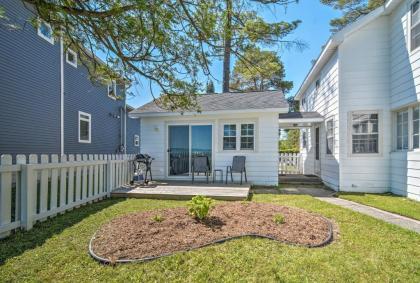 Modern Torch Lake Cottage with Dock and Fire Pit! - image 11