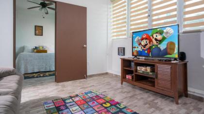 Two-bedroom suite decorated with video game theme - image 8