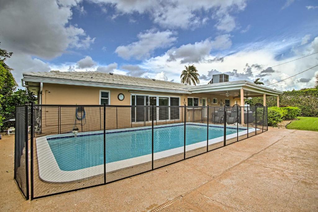 Riviera Beach Home with Pool - Walk to Beach! - main image