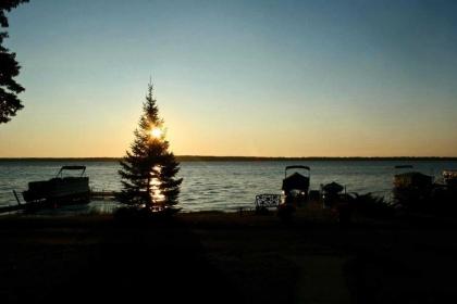 Lakefront Roscommon Home with Dock Patio and Games Roscommon Michigan