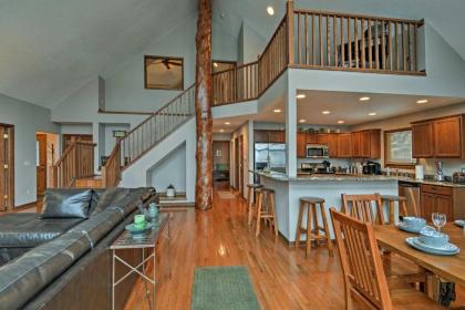 Lakefront Roscommon Home with Dock Patio and Games! - image 14