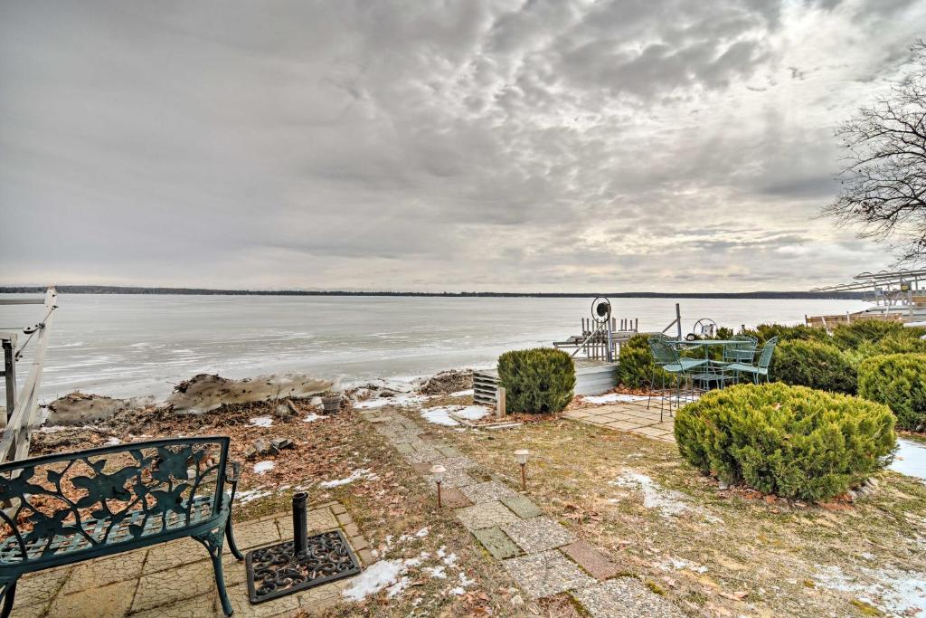 Lakefront Roscommon Home with Dock Patio and Games! - image 5