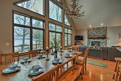 Lakefront Roscommon Home with Dock Patio and Games! - image 7