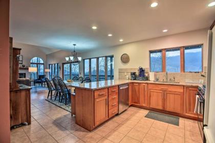 Large Hillside Home with Spacious Deck and Game Room! - image 8