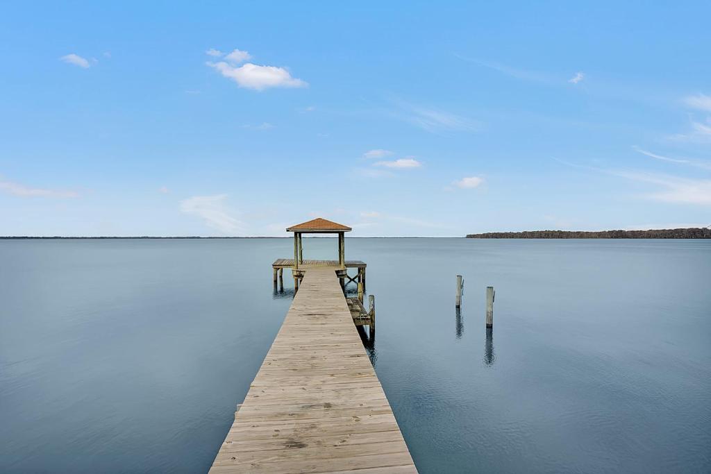 Riverfront Duplex with Dock Fishing Charcoal BBQ AMAZING Sunsets!! - main image