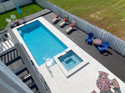 Blue Brilliance Heated Pool Steps to the Beach Access and Boat Ramp Jungle Vibes Florida