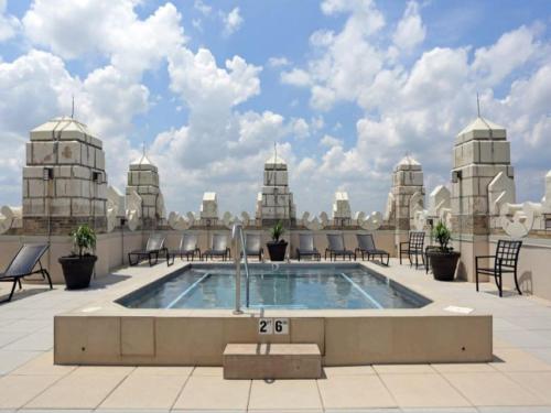 Jacuzzi in the sky Luxe 2BR condo with parking by CozySuites - main image