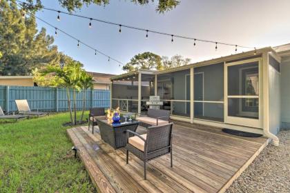 Contemporary Cottage with Sunroom and Fire Pit Sarasota