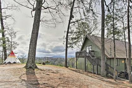 Camp Themed Sevierville Cabin with Hot Tub and Teepee!