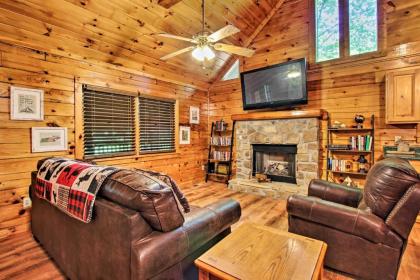 Explore Pigeon Forge Charming Cabin with Hot Tub! - image 1