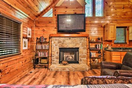 Explore Pigeon Forge Charming Cabin with Hot Tub! - image 2