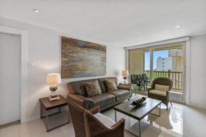 Seconds away from the Beach and pool! Beautiful condo with beachview balconies Pet Friendly