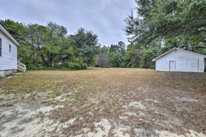 Sweet Southern Pines Abode with Yard and Covered Porch - image 12