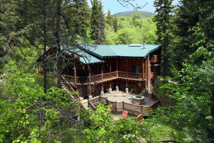 Log Cabin On The Stream