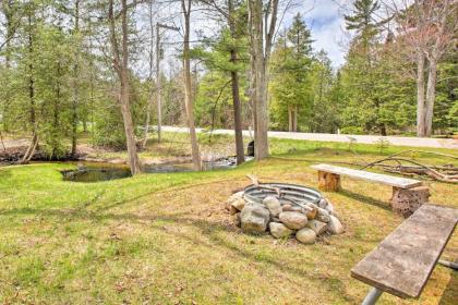 Cozy Suttons Bay Studio with Fire Pit-Walk to Beach! - image 13