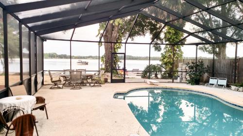 Waterfront Home with Pool and Dock Walk to Hard Rock! - image 3