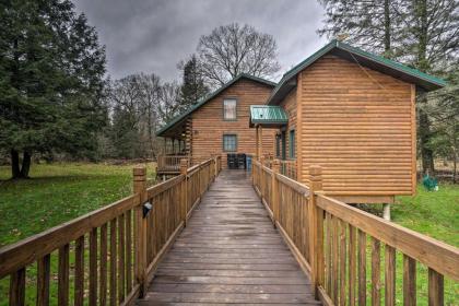 Scenic Log Cabin with Fire Pit and Stocked Creek! - image 13