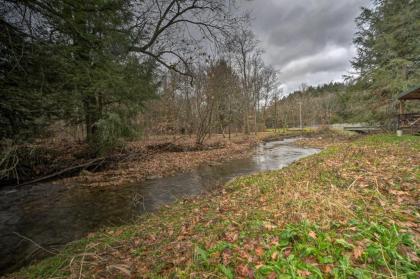 Scenic Log Cabin with Fire Pit and Stocked Creek! - image 6