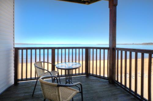 Beachside 216 with Pool Hot Tub and Private Deck Overlooking East Bay - main image