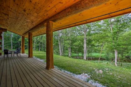 Custom Log Cabin with Deck and 45 Acres by Pine River! - image 6