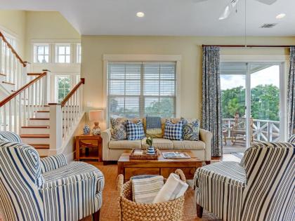 New Listing! Heated Pool Access Gorgeous Tybee Home with Elevator Walk to Beach & More! - image 1