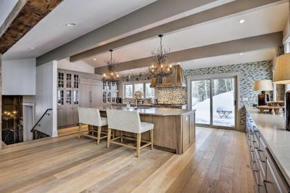 Mountain Masterpiece with Hot Tub and 2 Living Areas! - image 1