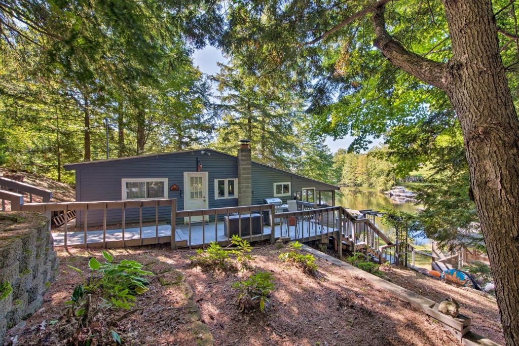 Waterfront Weare Cottage with Fire Pit and Kayaks - main image