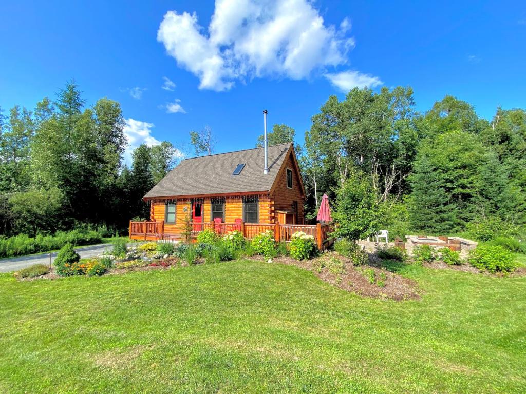 BC Log cabin with private beach river fire pit AC wifi onsite trails ski slope views! - main image