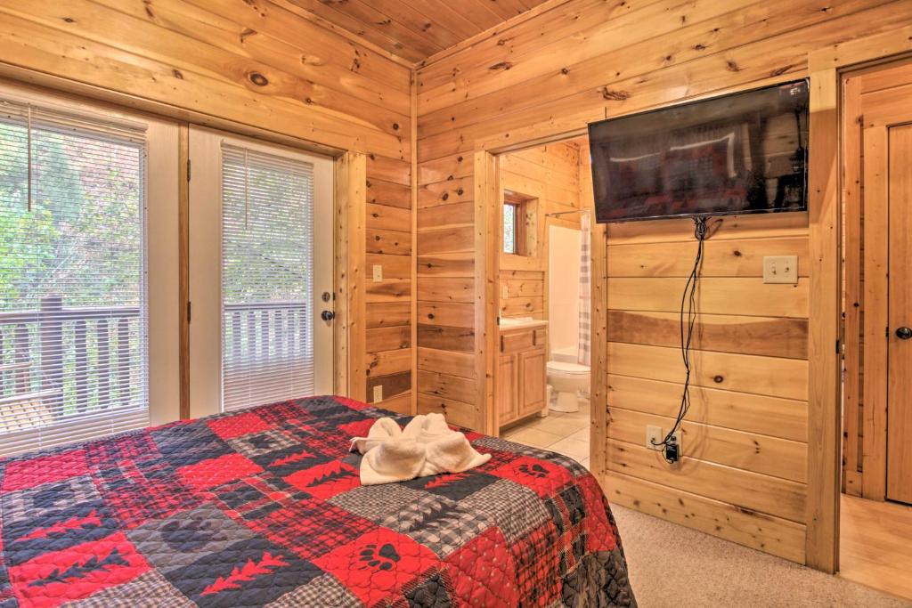 Spacious Pigeon Forge Resort Cabin with Hot Tub - image 2