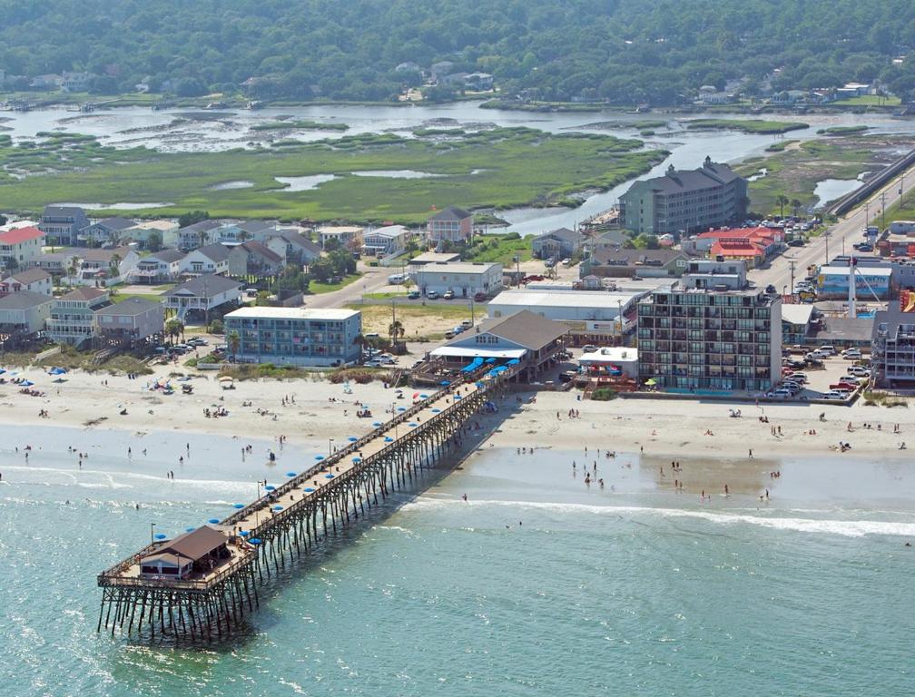 Tranquil Oceanfront Resort Vacation Suites in Garden City Beach - image 4