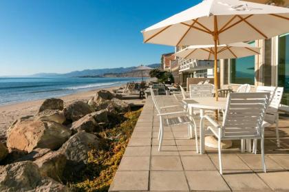 New Listing! Beachfront Dream With Private Balcony Home